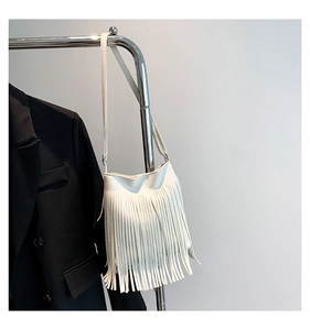 White lychee pattern leather shoulder bag with long fringes and adjustable strap