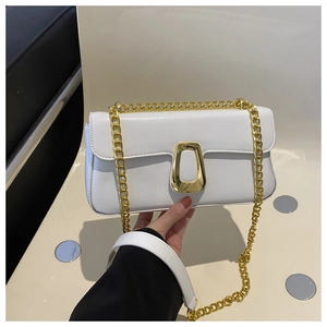Minimalist white leather flap bag with gold chain strap and chunky U-shaped metal buckle