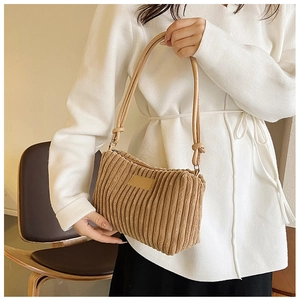 Khaki corduroy shoulder bag for women with textured fabric and leather strap details