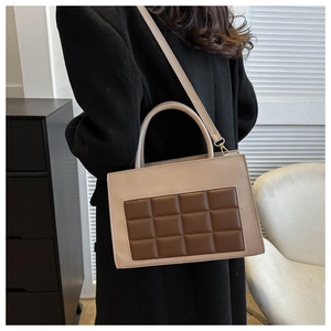 Minimalist checkered crossbody bag in beige and brown leather shown on female model