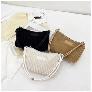 Corduroy shoulder bags in black, white, and khaki with stylish knotted rope straps