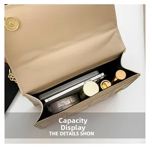 Internal capacity of beige quilted leather crossbody bag with smartphone and cosmetics