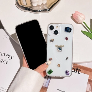 Transparent iPhone case featuring colorful gemstones and gold Diamonds text engraving