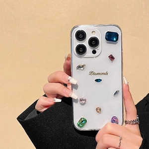 Detail of luxury iPhone case featuring colorful rhinestones and gold Diamonds text