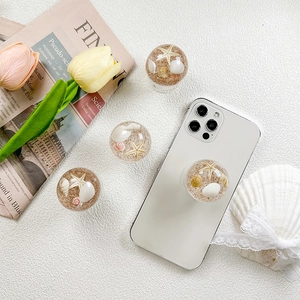 Retractable phone socket with ocean beach resin design featuring starfish and seashells