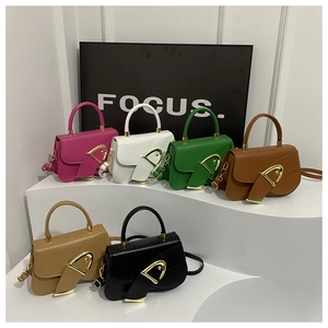 Chic saddle-shaped handbag in multiple colors with gold D-buckle and shoulder strap
