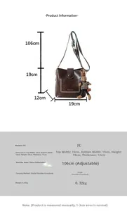Detailed size chart for brown retro PU bucket bag with patterned strap and bunny charm