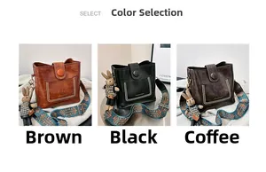 Detailed view of three vintage crossbody bucket bags with wide jacquard straps and rabbit charm