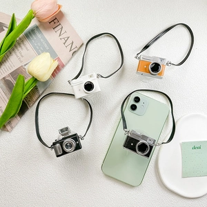 Retro camera phone socket grip with retractable stand and lanyard in four classic colors