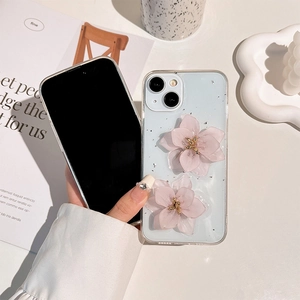 Transparent iPhone case with 3D pink flowers and shimmering silver foil accents