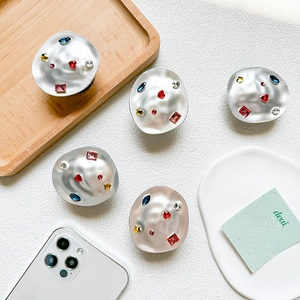 Chic silver hammered metal phone socket grip featuring colorful luxury rhinestone accents