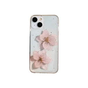 Clear iPhone case with 3D pink resin flowers and sparkling silver foil flakes decoration
