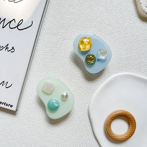 Elegant pearl and gemstone phone grip holder in light blue and mint green set