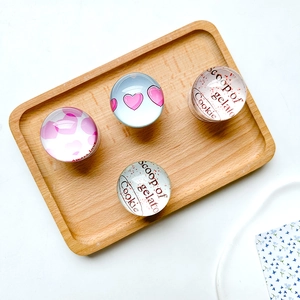 Creative glass heart phone grips in a set of four with various artistic designs