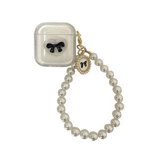 Clear AirPods case with black bow and white pearl wrist strap for Pro/1/2/3