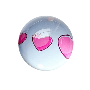 Collapsible round glass phone grip with three pink hearts and glossy finish