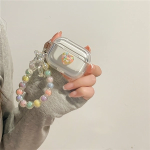 Clear AirPods case featuring a 3D colorful glitter heart and beaded wrist strap