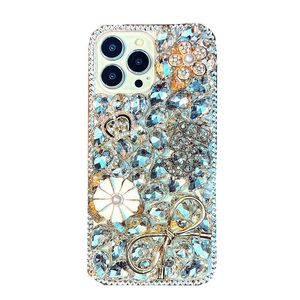 Luxury rhinestone iPhone case with golden crown, pearl flowers and diamond bow decoration