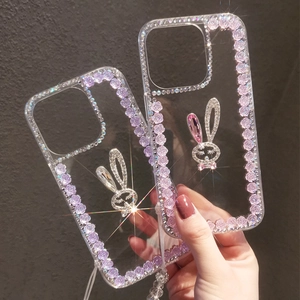 Luxury transparent iPhone case with silver rhinestones and 3D purple flower rabbit