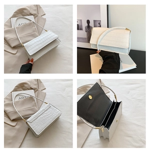 Vue détaillée du sac bandoulière blanc à motif crocodile avec compartiments de rangement