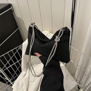 Sparkling black rhinestone evening bag with elegant silver crystal knot shoulder strap