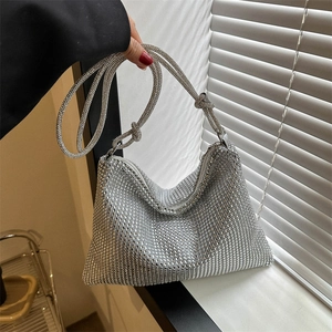 Chic silver rhinestone shoulder bag with crystal mesh and elegant knot handle detail