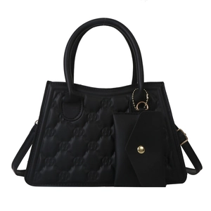 Black quilted two-in-one handbag with letter embossing and detachable envelope pouch