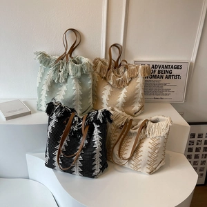 Bohemian knit fringe tote bags in four colors with leather straps and geometric patterns