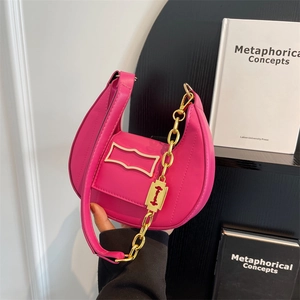 Fashionable rose pink crescent underarm bag with gold chain and leather strap