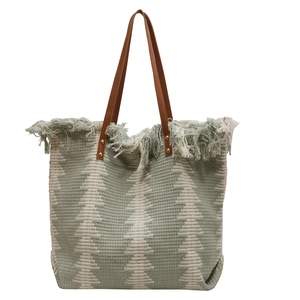 Woven tote bag with geometric patterns, long fringe tassels and leather handles