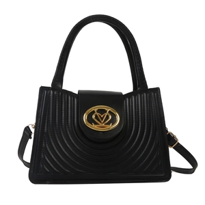 Minimalist black leather handbag with gold heart buckle and quilted texture detailing