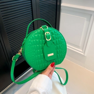 Borsa a mano tonda verde con stampa coccodrillo, dettagli dorati e manico donna