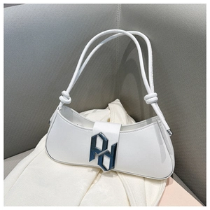 Detail of white minimalist underarm bag with PD metal logo and knotted shoulder straps