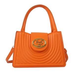 Elegante oranje PU-lederen handtas met concentrische stiksels en een gouden metalen slot