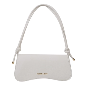 White faux crocodile skin shoulder bag featuring gold lettering and knotted strap design