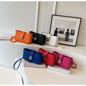 Quilted leather crossbody bags in six vibrant colors displayed on a modern white pedestal