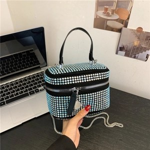 Blue rhinestone clutch evening bag with silver chain and black leather handle for women