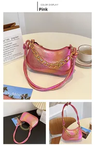 Detail of pink laser leather half moon bag with textured finish and chunky gold chain