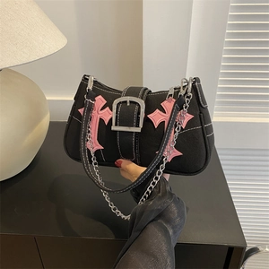 Y2K punk style black canvas shoulder bag with pink cross patches and silver chain strap