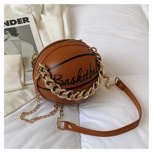 Detail of creative basketball-shaped crossbody bag with brown PU leather and chain strap