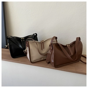 Minimalist vintage shoulder bags in black, beige, and dark brown with smooth faux leather