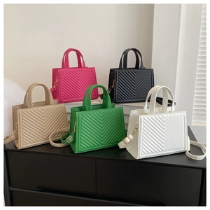Quilted small square crossbody bags in five colors with refined V-shaped stitching detail