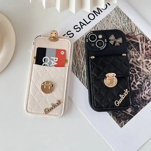 Detail of diamond-quilted PU leather iPhone case with metal lock wallet and D-ring