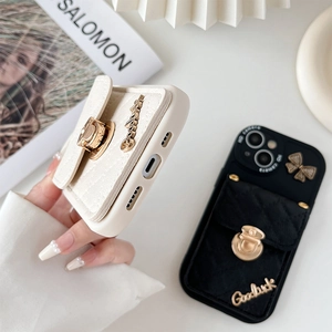 Detailed view of quilted leather wallet case for iPhone with a golden metal twist lock