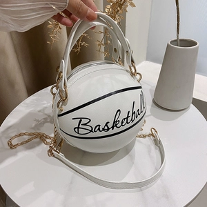 White basketball-shaped handbag with pebbled texture and gold chain strap for women