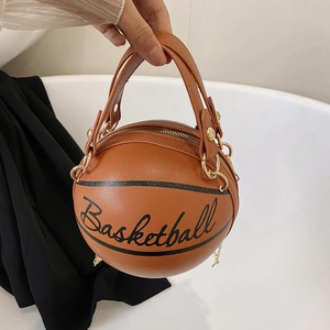 Brown basketball-shaped handbag with pebbled texture and gold chain strap for women