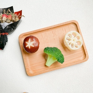 Detailed top view of mushroom and broccoli shaped retractable mobile phone socket stands