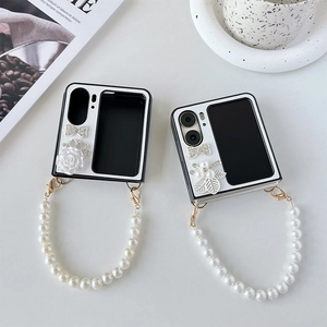 Detail of floral flip case with pearls and camellia for folding screen smartphone