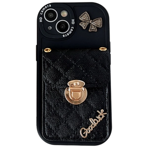 Black iPhone case with quilted wallet, diamond bow accent, and gold swivel lock detail