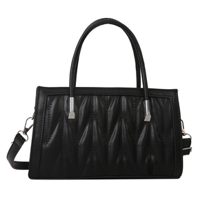 Classic black V-quilted handbag with silver hardware and detachable crossbody strap